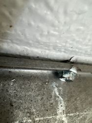 Lags starting to tear out of strut.