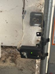 Sensor rewired. Track bolted. Adjusted.