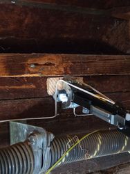 New garage door opener mounting bracket
