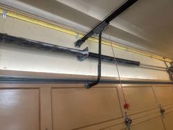 Temporary spring repair while waiting for new door.