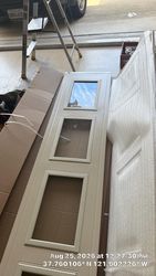 Old Door Removed, New CHI - 2250 LONG PANEL Clear Windows Stockton Design    door ready to go up