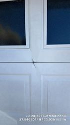 Old noninsulated door that needs replacement.