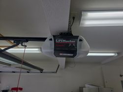 Old LiftMaster chamberlain motor will be replaced with a nine eight zero two two side mount LiftMaster.