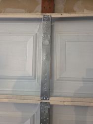 Replacement garage door center style after it's been bent back into 90% satisfaction