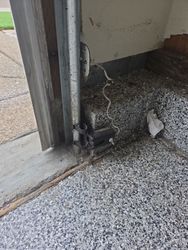 Old grout door safety sensor will be replaced with a brand new one.