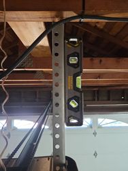 Perfectly level. Garage door smart opener. Mounting bracket.