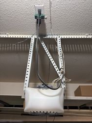 Old opener mount, not in good shape. Messy wiring, not very stable. Will be replaced if estimate is approved. Free.