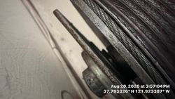Unsecured end plate, probably worn out bearing.