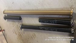 Spring comparison. Theirs versus ours. Valiant versus the competitors. This is why Valiant is the most honest and straightforward garage door company that cares about his customers. Which spring do you think will last longer? The gold one or the black one? I'll be honest.