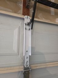 Finishing with a powdered coated rice o r b.Bracket for a garage door