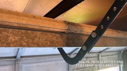 Bent Garage door support strut