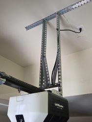 Brand new garage door smart open open lift master with a signature V mount from giant garage door.
