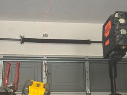 Level setup. Operator mounting bracket. Operator JR bracket installed.