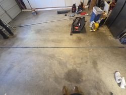 Old dent, garage door, torsion tube.