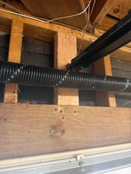Old Opener Mount Was Flimsy Angle Iron That Made Noise and Extra Movement