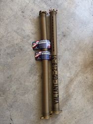 Service Spring Corp DuraMaster powder coated torsion springs. Custom stencil, valiant garage door, warranty cards to register your products. Made in The US.