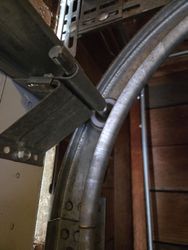New Garage Door Roller To Replace The Old Plastic Cracked One