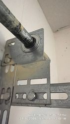 Black ring of deaths on the torsion system indicating the bearings are bad in the end plates or at least severely worn.