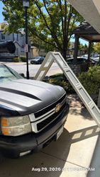 Extremely  bent garage door Took a creative shot for social media