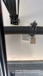 Crooked opener mounting bracket.