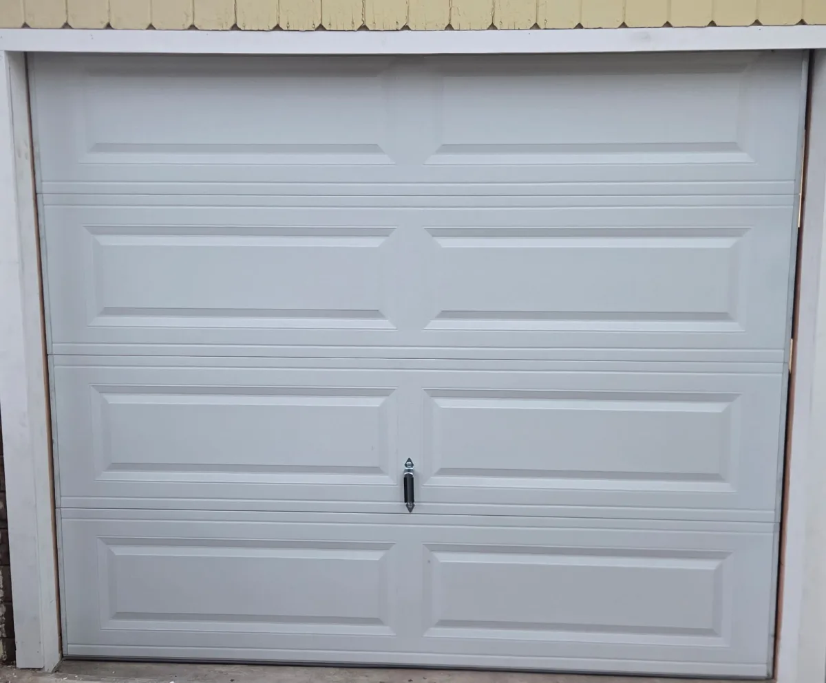 After photo of completed community garage door project