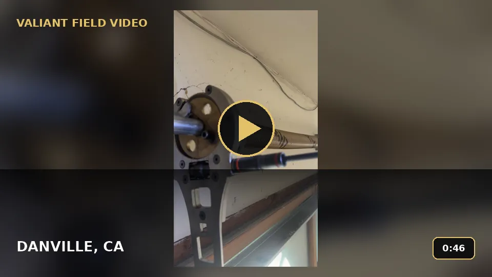 What Does a Garage Door Torsion Spring Assembly Look Like? video poster