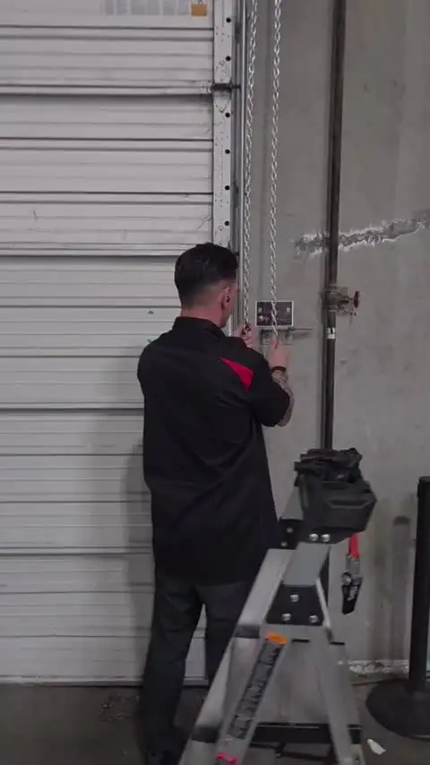 Valiant Garage Door real job photo 38: Chain Hoist Instruction Poster