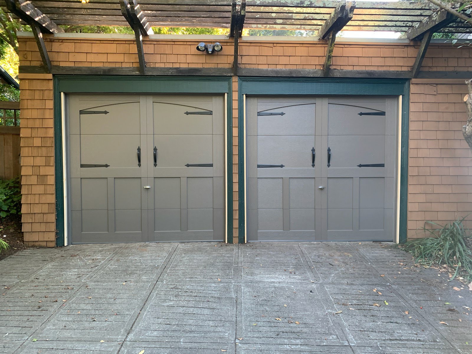 carriage style dual garage doors fabricated by Valiant Garage Door